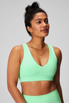 On-The-Go Midi Medium Impact Sports Bra Fabletics green female Activewear >> Womens >> Sports Bras >> Sports Bra >> Medium Impact regular Medium-impact style with cut-out detail Green Activewear For Training, Green Stretch Activewear For Sports, Green Moisture-wicking Activewear For Training, Green Sportswear For Training, Green Stretch Activewear For Training, Green Sports Bra For Training, Green Breathable Gym Activewear, Breathable Green Activewear For Gym, Green Athleisure Activewear For Gym