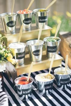 an assortment of ice creams are lined up on a table