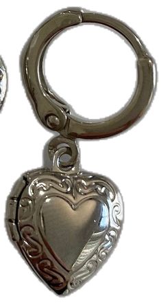 Silver Heart Earrings With Charms, Silver Heart-shaped Charm Earrings, Silver Heart-shaped Earrings With Charms, Heart Charm Metal Earrings For Gift, Nickel-free Open Heart Metal Jewelry, Silver Charm Hoop Earrings, Heart-shaped Stainless Steel Pierced Jewelry, Pierced Heart-shaped Stainless Steel Jewelry, Silver Metal Earrings With Charms