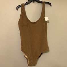 Nwt Brown One Piece Swimsuit!!! Brand New With Tags. Perfect Condition. Super Flattering / Sexy With The Open Back & Bow. Could Also Be Worn As A Bodysuit Size: Xl Brown Beachwear Bodysuit For Vacation, Brown Summer Bodysuit For Poolside, Brown Bodysuit For Poolside Summer, Stretch Brown Bodysuit For The Beach, Casual Brown One-piece Swimwear, Fitted Brown Bodysuit For Beach, Fitted Brown Bodysuit For The Beach, Summer Brown Lined Bodysuit, Fitted Brown Bodysuit For Beach Season