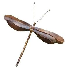 Drevy flamed copper wall mount dragonfly. This nature-inspired gift and accessory for your garden is created using natural materials. Handcrafted to create an item that is handsome, built to last and of good value. This item is made using honest materials such as wood, clay, iron, copper, stone and brass. Measures 20-inch l x 20-inch w x 1.25-inch h. Dragonfly Metal Wall Art, Copper Wall, Natural Materials, Accent Wall, Wall Mount, Nature Inspiration, Copper, Brass, Wall Decor