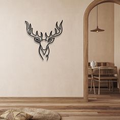 a deer head is mounted to the wall