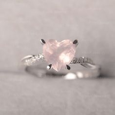 ◆ The ring is handcrafted from sterling silver and decorated with a dazzling 8*8 mm Pink Quartz and CZs. It is suitable for engagement/anniversary/daily occasion. ◆ Production Description: Main stone Type: Pink Quartz Main Stone Shape: Heart Cut Main Stone Size: 8*8 mm(1.79ct) Side stone: CZ Metal: 925 Sterling silver - Other options available in the drop down menu ◆ Customization: √ Free for Add Engraving √ Other Metal Type Available √ Other Gemstones & Shapes Available √ Personalization Re Elegant Pink Heart Promise Ring, Pink Rings Heart, Silver Heart-shaped Crystal Promise Ring, Pink Heart-shaped Promise Ring Jewelry, Pink Rose Quartz Promise Ring, Ring Twisted Band, Pink Quartz Ring, Cute Promise Rings, July Birthstone Ring