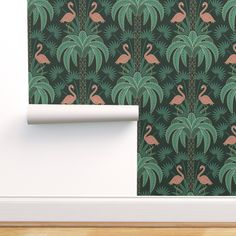 flamingos and palm trees wallpaper in a room