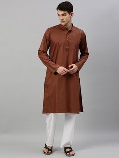 The Handmade Solid Color Indian Handmade Short Shirt or Kurta * Metal : Cotton * Color : Brown (Sam As Picture *Length : As you Selected  *Kurta Chest is measurement for shirt (not body) As per standard, for best loose fitting 6 inches gap should be there between actual chest size and shirt chest size Size chart is below Men's Sizes Note : Actual Body Chest - Ready Shirt Chest i Add 6" Inches Lose Fitting Fabric Armhole To Armhole. Wash Care : Dry Clean Only Material: Cotton Plain White Pajama A Traditional Brown Kurta For Transitional Season, Traditional Brown Cotton Kurta, Brown Traditional Straight Kurta, Casual Long Sleeve Brown Kurta, Brown Kurta For Men, Mens Party Wear, White Pajamas, Kurta Men, Indian Man