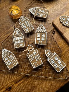 gingerbread cut out houses on a cooling rack