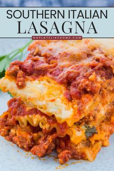 lasagna with meat sauce and cheese on a white plate