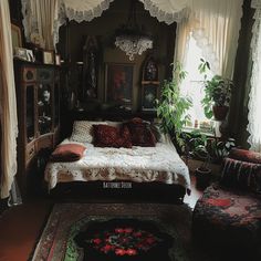 a bed sitting in the middle of a bedroom next to two chairs and a rug