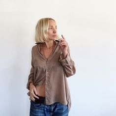 Introducing the Goddess Shirt designed by Katia herself! The Goddess shirt is a classic oversized button-down shirt in 100% Viscose (looks like silk, feels like cotton!). The drop shoulder and sheerness of this shirt give a casual and boho look. Wear it untucked, tucked, or tied. Just like our jewelry, you do you and t Chic Relaxed Fit Shirt With Rolled Sleeves, Everyday Long Sleeve Blouse With Rolled Sleeves, Chic Rolled Sleeves Shirt For Daywear, Effortless Collared Fall Blouse, Chic Blouse For Layering With Shirttail Hem, Chic Collared Blouse With Rolled Sleeves, Chic Blouse With Rolled Sleeves And Relaxed Fit, Chic Blouse With Rolled Sleeves For Daywear, Effortless Button-up Blouse With Rolled Sleeves