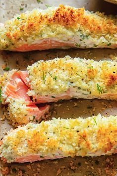 salmon fillets with parmesan cheese and dill sprinkled on top