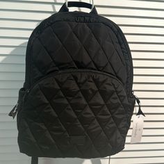 Nwt Vera Bradley Large Black Quilted Backpack With Outside Zipper Pocket. There Is Also Two Utility Pockets On The Sides. Inside Has A Large Slip Pocket With Vera Bradley Signature Floral Design. Measures H 17”X W 12”X D 6” Quilted Backpack, Utility Pockets, Black Quilt, Vera Bradley Bags, Large Black, Vera Bradley, Zipper Pocket, Floral Design, Bag Lady