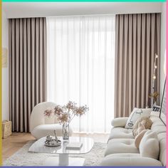 a living room filled with white furniture and curtains