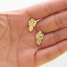 Look stylish with these Nugget Earrings in 10k Yellow Gold. The height from the bail to the bottom is 0.64" and the width is 0.39". These shiny, sparkling Nugget Earrings have a 10k Stamp. They're perfect for everyday wear, a great addition to your Jewelry Collection, or a great gift for him or her. Luxury Nugget Jewelry For Anniversary, Classic Luxury Nugget Jewelry, Gold Nugget Earrings, Nugget Earrings, Clean Gold Jewelry, Golden Nugget, Expensive Jewelry Luxury, Gold Nugget, Expensive Jewelry