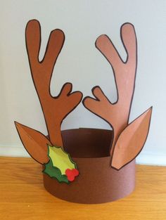 a paper hat with reindeer antlers on it