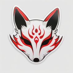 a red and black fox sticker on a white background