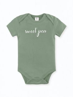 100% Organic cotton infant bodysuit in our Sweet Pea print. Tykes Corner uses certified organic baby clothing so Moms can feel at ease knowing our clothing is free of harmful chemicals and dyes. Sized 0-3, 3-6, 6-12, 12-18 months. Machine wash cold / Tumble Dry Low Remember to support small on your baby registry! Copy and paste the link or click on the Etsy icon in your Babylist app and search Tykes Corner. Basic Cotton Onesie For Spring, Green Cotton Onesie For Spring, Basic Cotton Short Sleeve Bodysuit For Summer, Green Cotton Bodysuit For Spring, Spring Organic Cotton Fitted Bodysuit, Organic Cotton Fitted Bodysuit For Loungewear, Cotton Onesie With Letter Print For Spring, Fitted Short Sleeve Organic Cotton Bodysuit For Summer, Fitted Organic Cotton Bodysuit With Short Sleeves