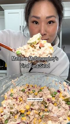 a woman holding a spoon full of food in front of her face with the words, mathew mc cornaughy's virtual tuna salad