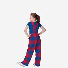 Show your team spirit in these stylish and comfortable Buffalo Bills Youth Plaid Bib Overalls. With their all-over team-colored design and bold team logo display, these overalls are the perfect way to show your support for the Buffalo Bills while showing off some buffalo plaid fashion for a rustic, rural feel. The bib pocket is perfect for storing your young fans toys, crayons, or other essentials, and the adjustable bib shoulder straps ensure a comfortable fit. Two back pockets provide even mor Buffalo Bills Apparel, One Piece Pajamas, Bib Overalls, Buffalo Bills, Plaid Fashion, Long Pants, Lounge Pants, Buffalo Plaid, Buffalo