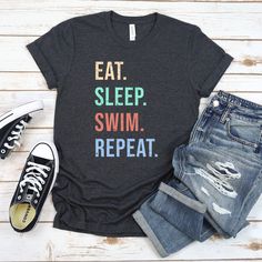 Embrace the world of swimming with our Swim tee. It's more than an outfit; it's an open invitation to dive into the joys of water. Whether you're a competitive swimmer or just a water enthusiast, this shirt lets you display your love for the aquatic life in style. Dive in and celebrate your passion for swimming! These irresistible shirts are exclusively made for you, with each order being tailored to perfection. Please allow a processing time of 3-5 days during non-peak season. This classic unisex jersey short sleeve tee fits like a well-loved favorite. Soft cotton and quality print make users fall in love with it over and over again. These t-shirts have-ribbed knit collars to bolster shaping. The shoulders have taping for better fit over time. Dual side seams hold the garment's shape for Fun Sports T-shirt With Letter Print, Fun Sports Tops With Letter Print, Fun Pre-shrunk Sports T-shirt, Fun Letter Print Sports Top, Sports Joke, Team Tshirt, Swim Coach, Gifts For Swimmers, Swim Shirt