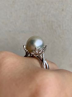 Excited to share this item from my #etsy shop: White south sea pearl ring grade. S925 sterling silver ring white gold plated. Seawater pearl. White pearl #southseapearl #seawaterpearl #indonesianpearl #australianpearl #naturalpearl #genuinepearl #sterlingsilver #pearlring Exquisite White Gold Akoya Pearl Ring, Exquisite White Akoya Pearl Ring, Silver Akoya Pearl Ring For Anniversary, Silver Akoya Pearl Drop Ring, Silver Akoya Pearl Ring In Fine Jewelry Style, Silver Akoya Pearl Ring With Pearl Drop, Exquisite Silver Pearl Ring For Anniversary, Elegant White Pear-shaped Ring, Elegant Pear Shaped Pearl Ring For Anniversary