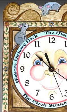 a clock with a mouse on the face