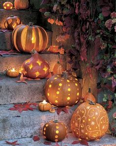 some pumpkins that are sitting on the steps