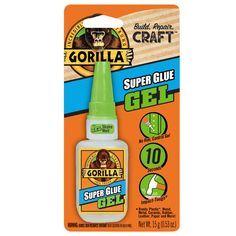 the gorilla glue is green and has an animal's head on it, as well as