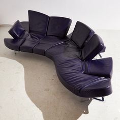 The perfect example for the sophisticated Italian design. Leather upholstered 'Flap' sofa from the 2000s designed by Francesco Binfaré for Edra. The sofa has flexible sides that can be easily reshaped to users. With some surface scratches and wear on the leather and metal parts.

Dimensions: 360 × 35-74 × 138 CM Edra Sofa, Display Cabinet Decor, Pouf Chair, Sofa Leather, Folding Sofa Bed, Dressing Table Desk, Folding Sofa, Ceramic Wall Decor, Sofa Lounge