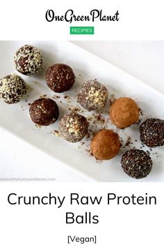 a white plate topped with chocolate truffles covered in crumbly raw protein balls