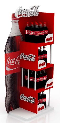 a coca - cola display case is shown with six bottles in it and one on the bottom shelf