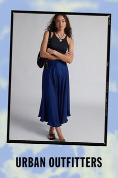 Flowing Kimchi Blue midi skirt in an updated drop-waist silhouette. Designed in satin featuring a mid-rise waistline, v-drop waist with button detailing and a floaty, a-line skirt. Finished with an asymmetric hemline for added movement. Only at Urban Outfitters. Features Kimchi Blue Vanessa drop waist midi skirt Asymmetric midi skirt Satin fabric with subtle sheen Mid-rise waistline V-shape drop waist with button detailing Floaty skirt with asymmetrical hem A-line fit Midi length UO exclusive Content + Care 100% Polyester Machine wash Imported Size + Fit Model in Blue is 5’9" and wearing size Small Measurements taken from size Small Length: 32.5" | Kimchi Blue Vanessa Drop Waist Midi Skirt in Blue, Women's at Urban Outfitters Flattering Midi Skirt For Summer, Chic Rayon Pleated Skirt, Rayon Midi Pleated Skirt, Rayon Pleated Midi Skirt, Spring Midi Length Bottoms For Night Out, Flowy Rayon Pleated Skirt, Rayon Pleated Flared Skirt, Blue Midi-length Bottoms For Summer, Blue Midi-length Summer Bottoms