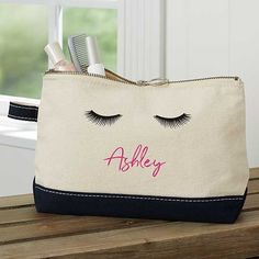 a personalized makeup bag with eyelashes on it