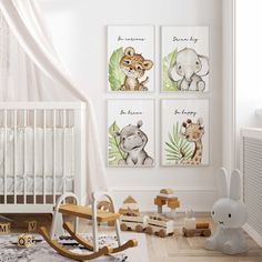 a baby's room with three pictures on the wall and toys in the floor