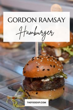 a close up of a hamburger on a stick with the words gordon ramsay hamburger above it