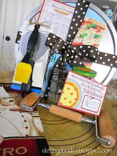 a table topped with lots of crafting supplies on top of a wooden table covered in polka dot ribbon