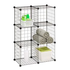 three tiered storage rack with towels and toiletries