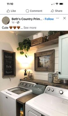 a washer and dryer sitting next to each other in a room with pictures on the wall