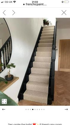 the stairs in this house have been painted black and beige with white trimmings