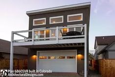 a two story house with an attached garage