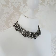 Elegant Metal Choker With Oxidized Finish, Elegant Metal Choker, Silver Bib Necklace Choker For Evening, Silver Oxidized Finish Choker For Party, Party Metal Bib Necklace With Jewels, Party Bib Necklaces With Jewels, Gunmetal Party Jewelry, Party Gunmetal Metal Necklaces, Party Necklaces In Gunmetal Metal