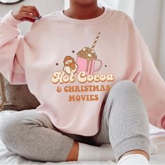 Hot Cocoa And Christmas Movies Crew Neck Sweater Color: Pink Size: Small, Medium, Large, X Large Let Me Know For More Sizes! Custom Made Gildan May Take 3-5 Business Days Material Is 50/50 Cotton/Polyester Machine Cold Wash, Make Sure To Flip Sweater Inside Out Before Washing. Runs A Lil Big As Women's Small But Sweater Is 100% Cotton So Will Shrink In Dryer. This Is A Perfect Gift For Your Friends Or Family Or For Yourself Winter Sweaters Oversized, Hot Cocoa Christmas, Womens White Sweater, Cocoa Christmas, Hot Sweater, Christmas Sweaters For Women, Maroon Sweater, Custom Sweatshirts, Mom Sweatshirt