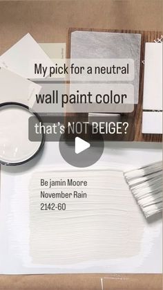 some white paint is being used to create an art project with the words,'my pick for a neutral wall paint color that's not beige? '