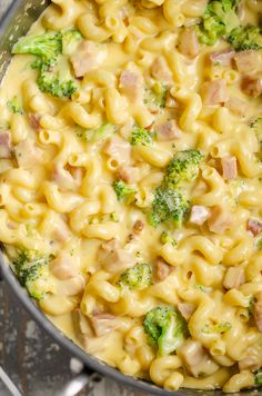 a pot full of macaroni and cheese with ham