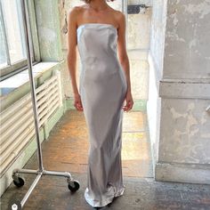 New ! Size S 100% Silk Hand Wash Partially Lined Hidden Back Zipper Closure Boned Bodice Satin Fabric With Back Vent Our Style No. Aeux-Wd56 Manufacturer Style No. A23q11028 1085 Auteur Solene Dress Silver Silk Strapless Elegant S Nwot $890 Fitted Silk Strapless Evening Dress, Fitted Strapless Silk Evening Dress, Fitted Silk Strapless Dress, Silk Fitted Strapless Dress With Straight Neckline, Glamorous Fitted Silk Strapless Dress, Boned Bodice, Silver Silk, Dress Silver, Silver Dress