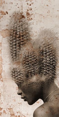 an artistic photo of a woman with hair in the shape of spikes on her head