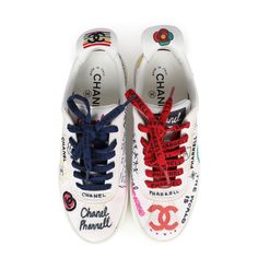 This pair of limited edition Chanel low top sneakers designed by Pharell, are in white canvas with multicolor Chanel designs, shoe laces with multicolor replacement and a rubber sole in size 35.5EUOrigin: ItalyCondition: Never wornAccompanied by: Chanel box, dustbag, multiple spare shoe laces.Size: 35.5 EU Designer Multicolor Sneakers With Rubber Sole, Multicolor Low-top Sneakers With Embroidered Logo, Designer Multicolor Custom Sneakers For Streetwear, Designer White Sneakers With Laces, Designer Custom White Sneakers With Rubber Sole, Luxury Multicolor Sneakers For Streetwear, Designer White Custom Sneakers With Rubber Sole, Designer Multicolor Custom Sneakers With Rubber Sole, Luxury Multicolor Low-top Sneakers