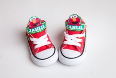 How adorable are these Elmo inspired converse! The perfect shoe to complete the look!Please leave your name needed in the notebox during checkoutVisit our boys section for the matching overalls or other items!If you are unsure of sizing please scroll to the last photos for our size charts, or visit our size charts here--> https://pinktoesnhairbows.com/pages/size-chartAll sales are FINAL, Ship dates can be found directly on the listing, please view our policies in detail here---> https://pinktoesnhairbows.com/pages/policies-terms-conditions Elmo Shoes, Boy Birthday Party Themes, Sesame Street Birthday Party, Pink Toes, Sesame Street Birthday, Boy Birthday Party, Perfect Shoes, Baby Birthday, Childrens Fashion