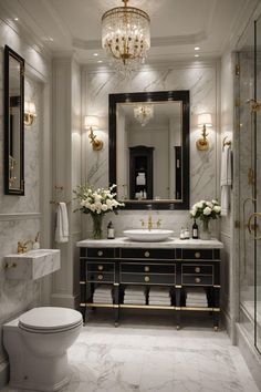 a bathroom with marble floors and gold accents