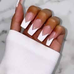 Fresh set! 💅🏽 Ask for: regular acrylic set with clear tips, narrow square shape, base color- natural yet opaque pink gel color so you cannot see your real nail line underneath (this is OPI “put it in neutral”), V french tips hand-painted on top with white gel polish & detail brush... I did a regular glossy top coat but this would probably be cute with a matte top coat too! #ravenelysenails  #Regram via @B5Dgc6DlopP