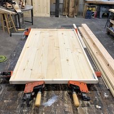 the table is being made and ready to be used as a workbench or bench